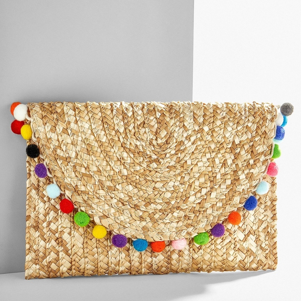 CARMELITA STRAW POM POM CLUTCH